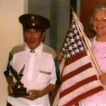 Joe and his wife, Gladys, with his homemade flag